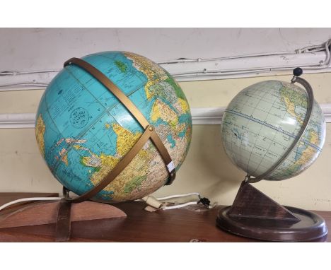 A Chad Valley clock globe,&nbsp;28cm high; together with another globe. (2) 