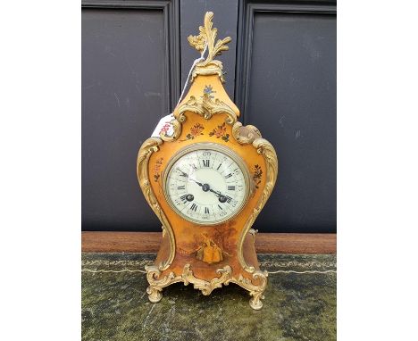 A Louis XIV style gilt lacquered and brass mantel clock,&nbsp;&nbsp;35.5cm high, with pendulum.&nbsp; 