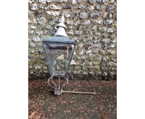 An antique wall mounting street lamp. 