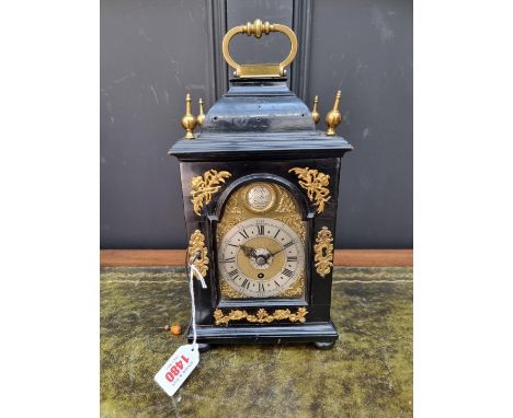 An interesting small antique ebonized table clock, the dial inscribed 'Nico Lambert, London', with fusee, pull repeat and bel