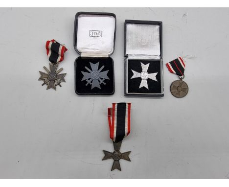 Medals:&nbsp;a collection of German World War II War Merit Crosses, to include both first and second class examples, with and