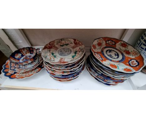 A collection of Japanese Imari plates and similar, to include some pairs. (21) 