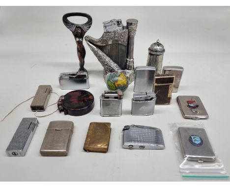 A collection of novelty lighters;&nbsp;together with a novelty globe pencil sharpner and others.&nbsp; 