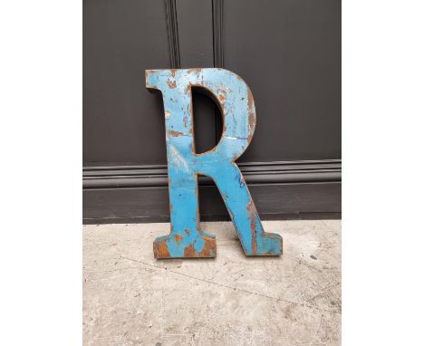 A blue painted steel 'R',&nbsp;51cm high.&nbsp; 