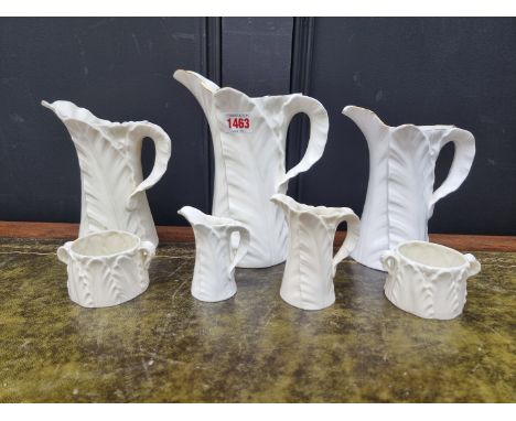 A collection of Royal Worcester 'fern leaf' pattern jugs and similar,&nbsp;largest 22cm high. (7) 