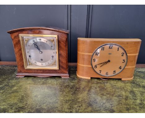 A good reproduction mahogany mantel clock,&nbsp;by Elliot, striking on 8 straight gongs, 23.5cm high; together with another 1