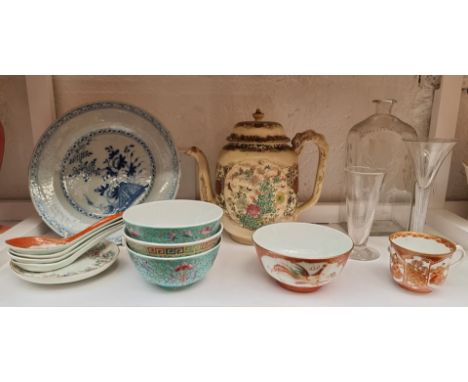 A mixed group of Chinese and Japanese ceramics; together with an antique Dutch glass gin bottle; and an air twist wine glass.