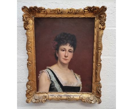 Follower of Emile Auguste Carolus-Duran, a head and shoulders portrait of a lady, oil on canvas, 59 x 46cm.&nbsp; 
