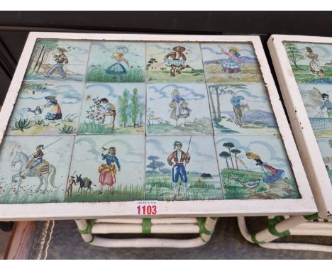 A pair of 1950s decorative tile inset low occasional tables, 43cm wide.
