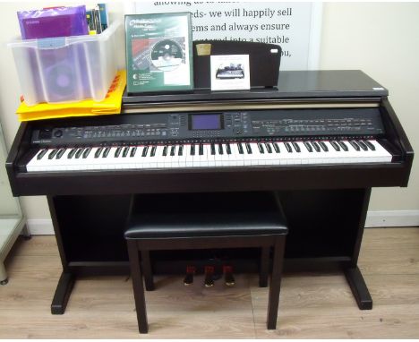 Yamaha Clavinova CVP 501 electric piano with associated piano stool and large selection of music instructions, assembly CD, t