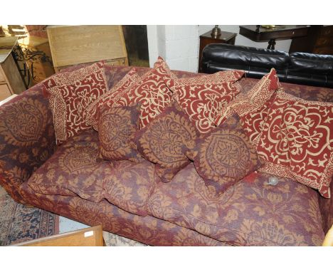 Extremely large two sear sofa with a selection of various scatter cushions 