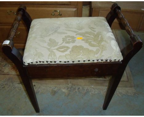 Mahogany piano stool with upholstered lift up lid
