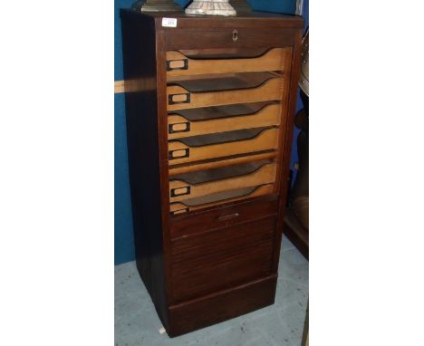 Early to Mid 20th C oak office cabinet with roller shutter door revealing slide out drawers