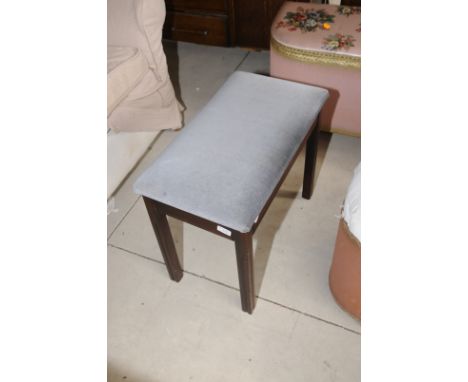 Piano stool with grey fabric seat