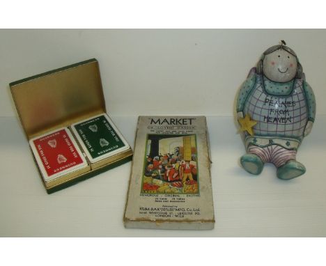 Market Covent Garden game, two packs of Guiness playing cards and Pennies From Heaven wooden money box