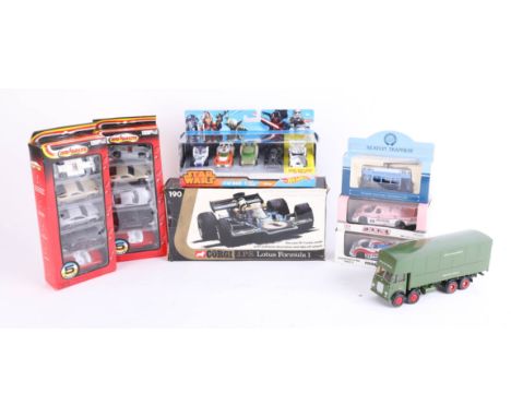 A mixed collection including Star Wars Hot Wheels 5 pack set, Corgi JPS Lotus, Majorette sets etc., all boxed (9).