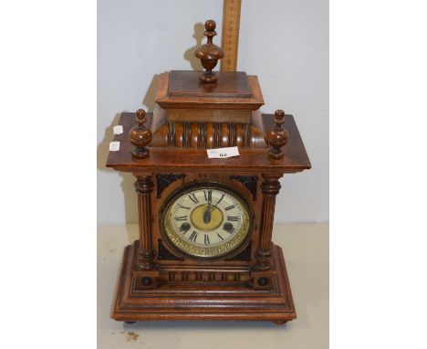 Late 19th or early 20th Century walnut cased mantel clock with brass movement