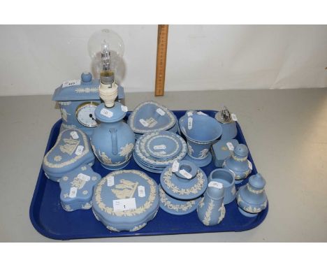 Collection of blue Wedgwood Jasper ware items to include trinket boxes, condiment items, mantel clock, table lamp etc