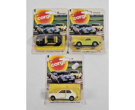 CORGI Juniors on racing car picture backs (3) - All carded vehicles are mint on card. Cardbacks vary from Good to Very Good. 