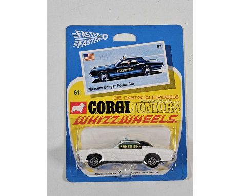 CORGI Juniors early 1970's on original Whizzwheels card #61 Mercury Cougar police car - All carded vehicles are mint on card.