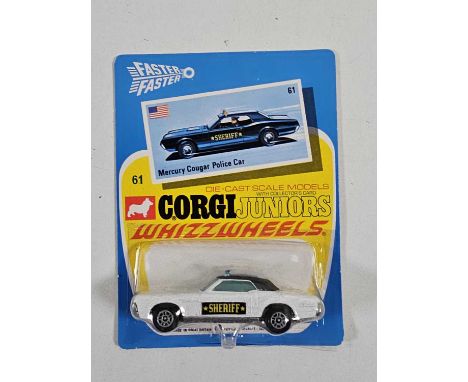 CORGI Juniors early 1970's on original Whizzwheels card #61 Mercury Cougar police car - All carded vehicles are mint on card.