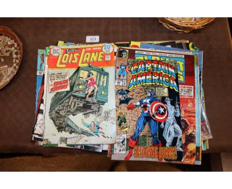 A collection of various comic books to include Marvel and DC, Spiderman, Titans, Planet of the Apes, Barbie, Captain America 