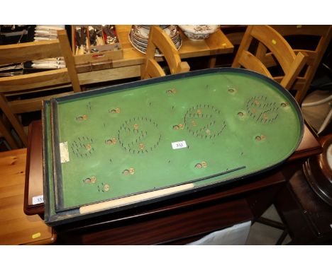 A bagatelle board 