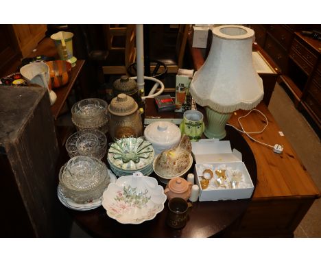 Two pottery Rumtoft jars, various other decorative pottery, table glassware, napkin rings and a table lamp