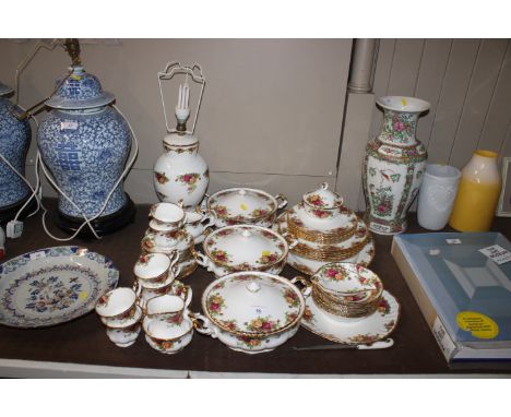 A quantity of Royal Albert "Old Country Roses" pattern tea and dinnerware to include tureens, plates, sauce boat on stand and