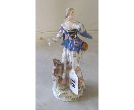 A 19th Century Meissen figure of a lady in blue and floral dress, impressed mark 1784, 31 in red and blue crossed swordshands