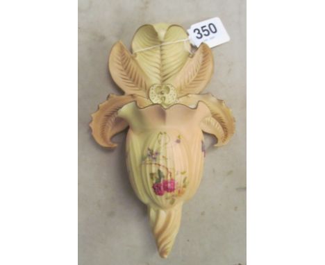 A Royal Worcester floral cream ware wall vase (restored)