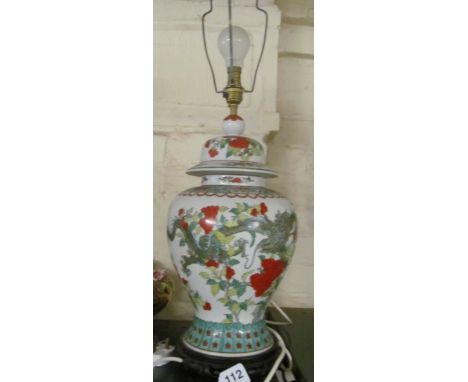 A 19th Century famille verte lidded vase decorated flowers converted to a table lamp 16" ceramic, 27" top shade fitting