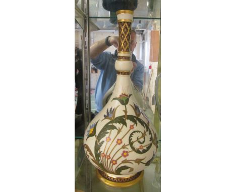 A Royal Worcester vase of baluster form (some gilt rubbed)