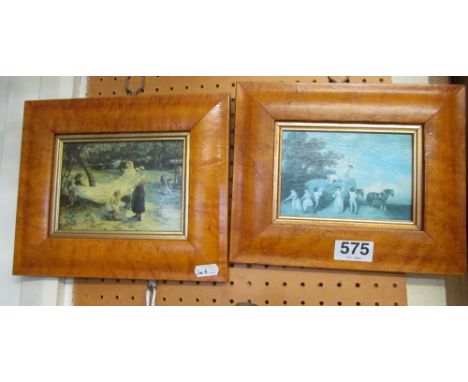 A pair of small prints in walnut frames