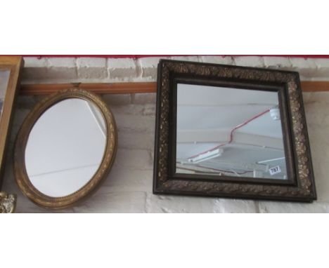 A rectangular mirror in gilt floral frame and a small oval gilt framed mirror