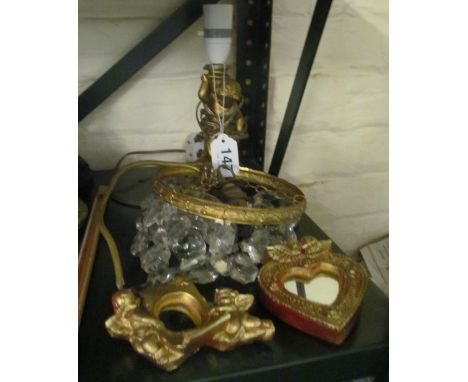 A basket form lustre ceiling light, cherub lamp and two small cherub mirrors
