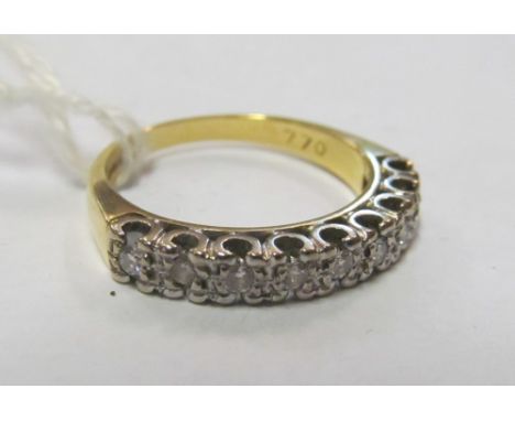 An 18ct gold illusion set half-hoop eternity ring size K