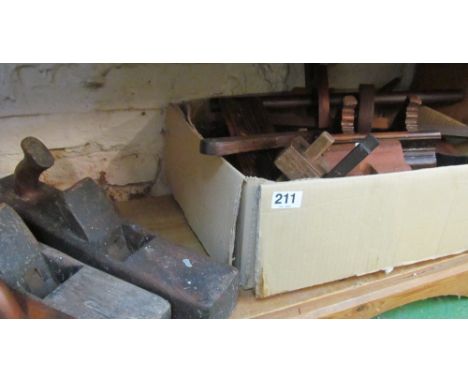 Various wood planes and other tools