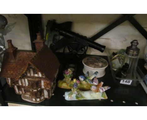 A pot lid, cottage (a/f), china, glass, barometer, cannon et cetera
