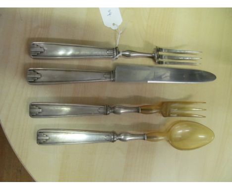 A pair of French Art Deco style Jean-Baptiste Potot salad servers and carving knife and fork