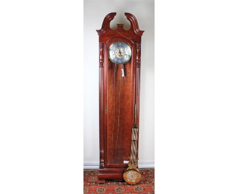 20th century mahogany Howard Miller longcase clock, silvered chapter ring, Arabic numerals, lunar phase to arch, striking on 