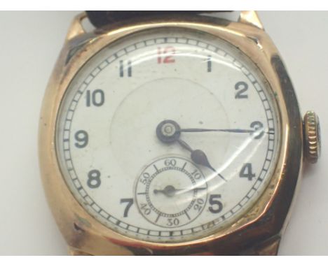 9ct yellow gold gents mid size Tank wristwatch on leather strap 