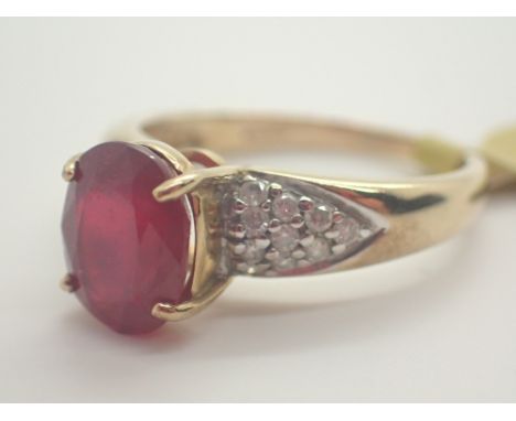 9ct gold ruby solitaire ring with diamond set shoulders size N / O 3.3g