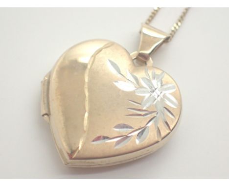 9ct yellow and white gold heart locket on 9ct gold necklace complete with interior