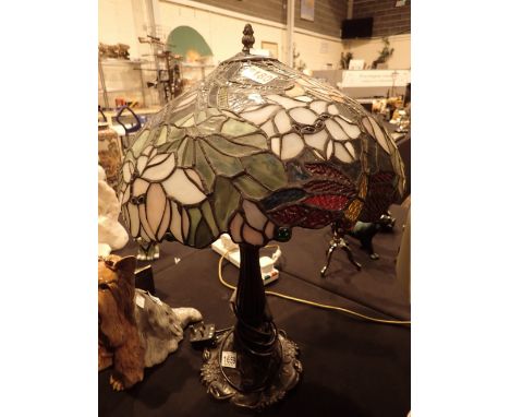 Large Tiffany style lamp on a metal base  CONDITION REPORT: The electrical items included in this lot have been PAT tested an