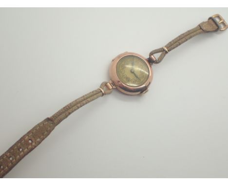 9ct yellow gold ladies wristwatch on leather strap 