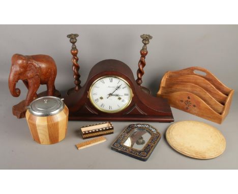 A collection of treen. Includes Maxim mantel clock, barley twist candlesticks, carved elephant etc.  