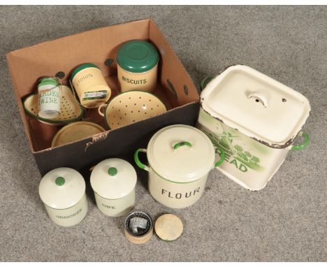 A box of mostly enamel ware. Includes bread bin, storage jars etc.  