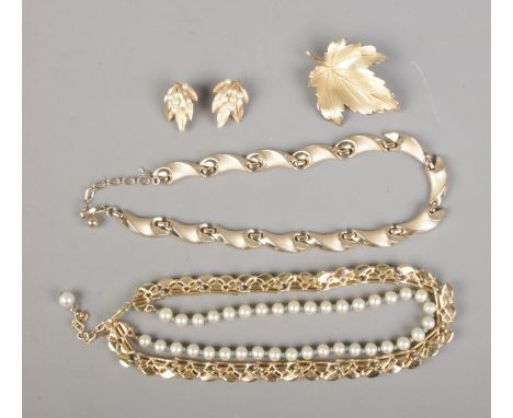 A collection of vintage gilt costume jewellery to include Trifari and Giovanni.  