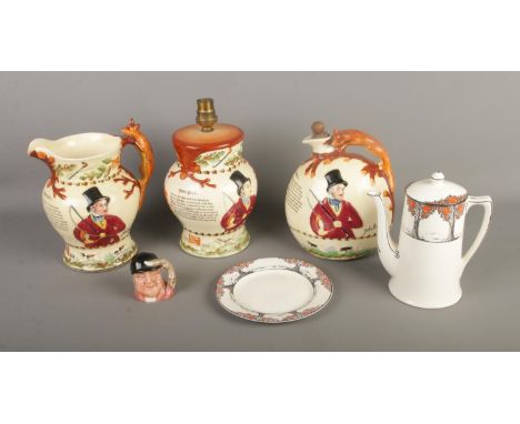 A collection of ceramics to include Crown Devon John Peel fox hunting musical jugs and non-musical lamp along with Royal Doul